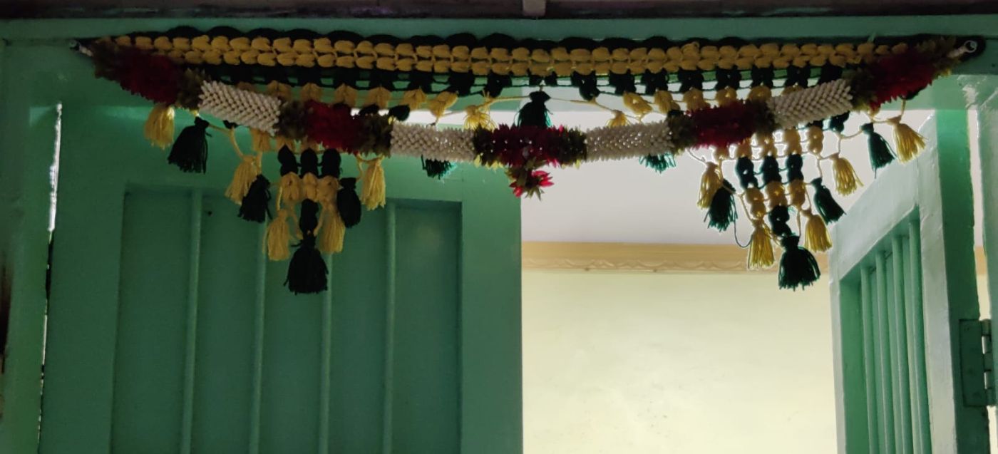 A toran outside of her house that she made