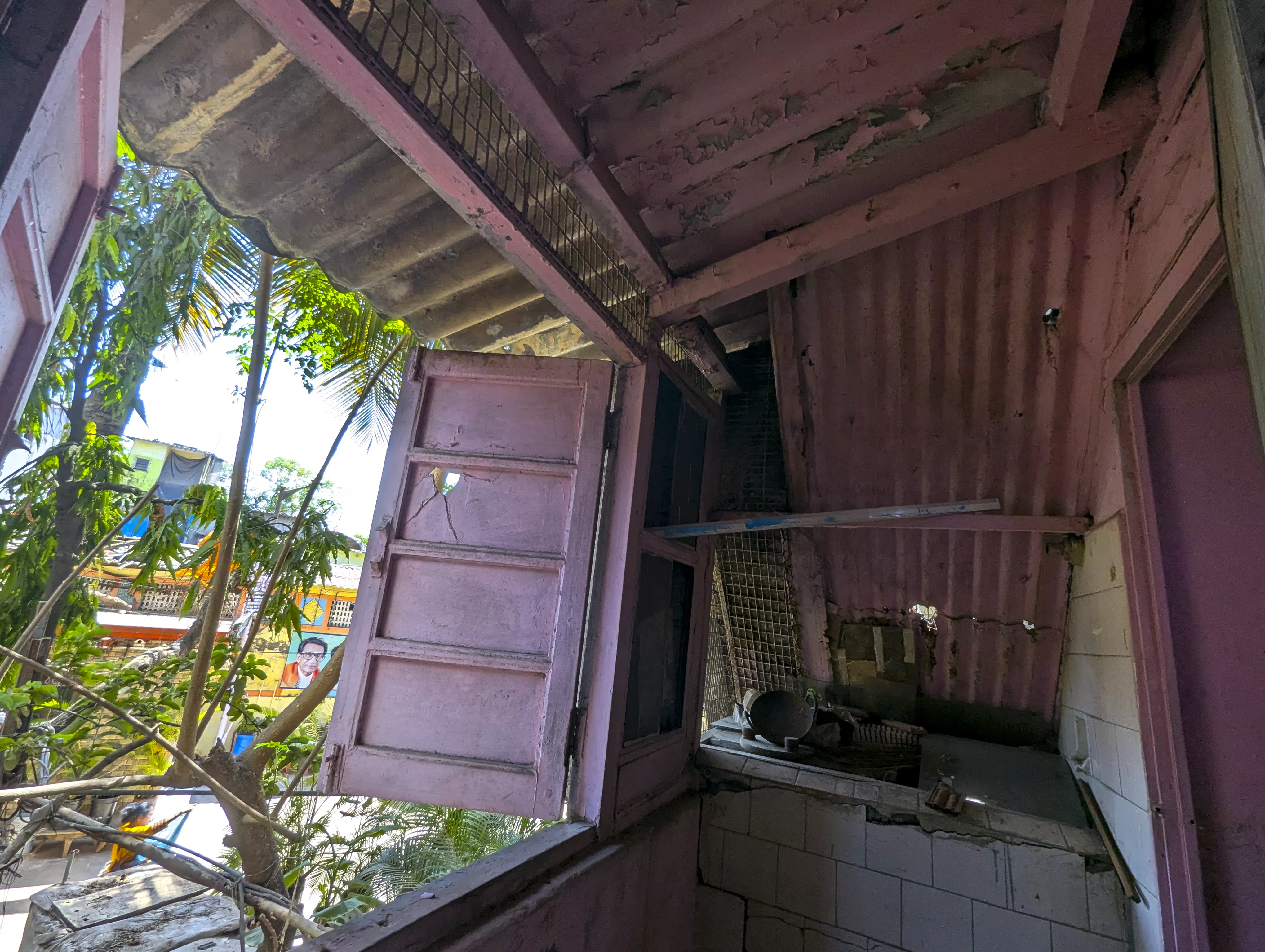 A corner of Rhea's home opening onto the neighbourhood outside.