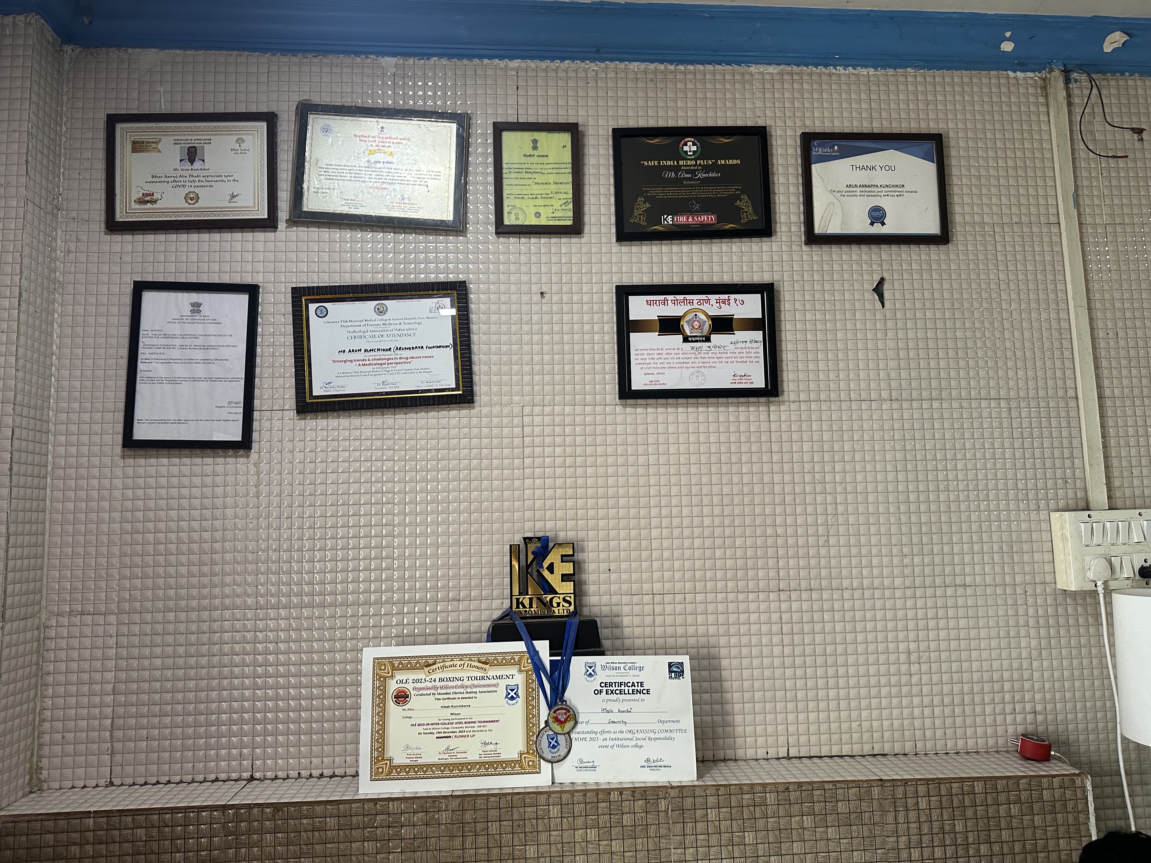 Arun's awards (up), his son's awards (down). They're competing with each other. 