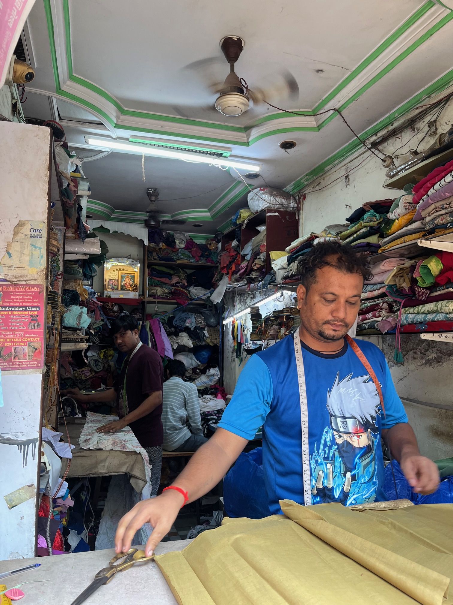 Anil and two of his employees, hard at work.