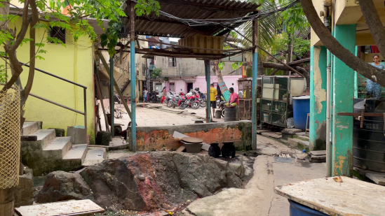 A holy bedrock in one of Dharavi Koliwada’s courtyards. 