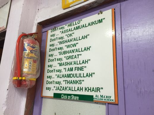 Poster from inside the Al Ma’Rif English School, recently established by the local Muslim community to teach various Arabic and Urdu classes to younger children.