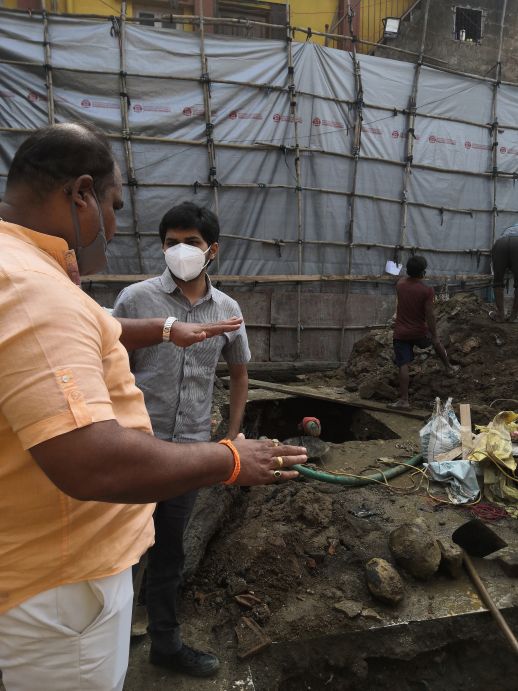 urbz team on site with contractor Joseph Koli, Dharavi