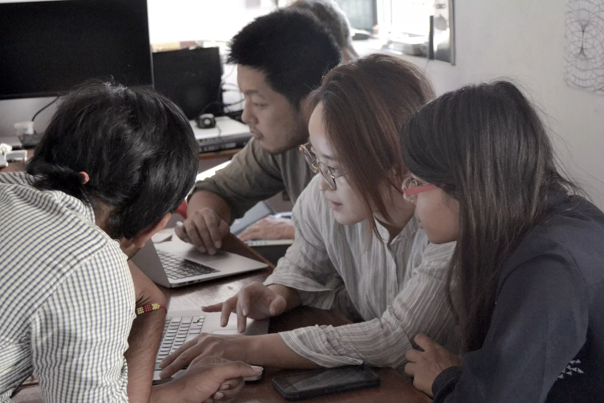 Participants back at the office to discuss ideas and follow their trails to other parts of the city.