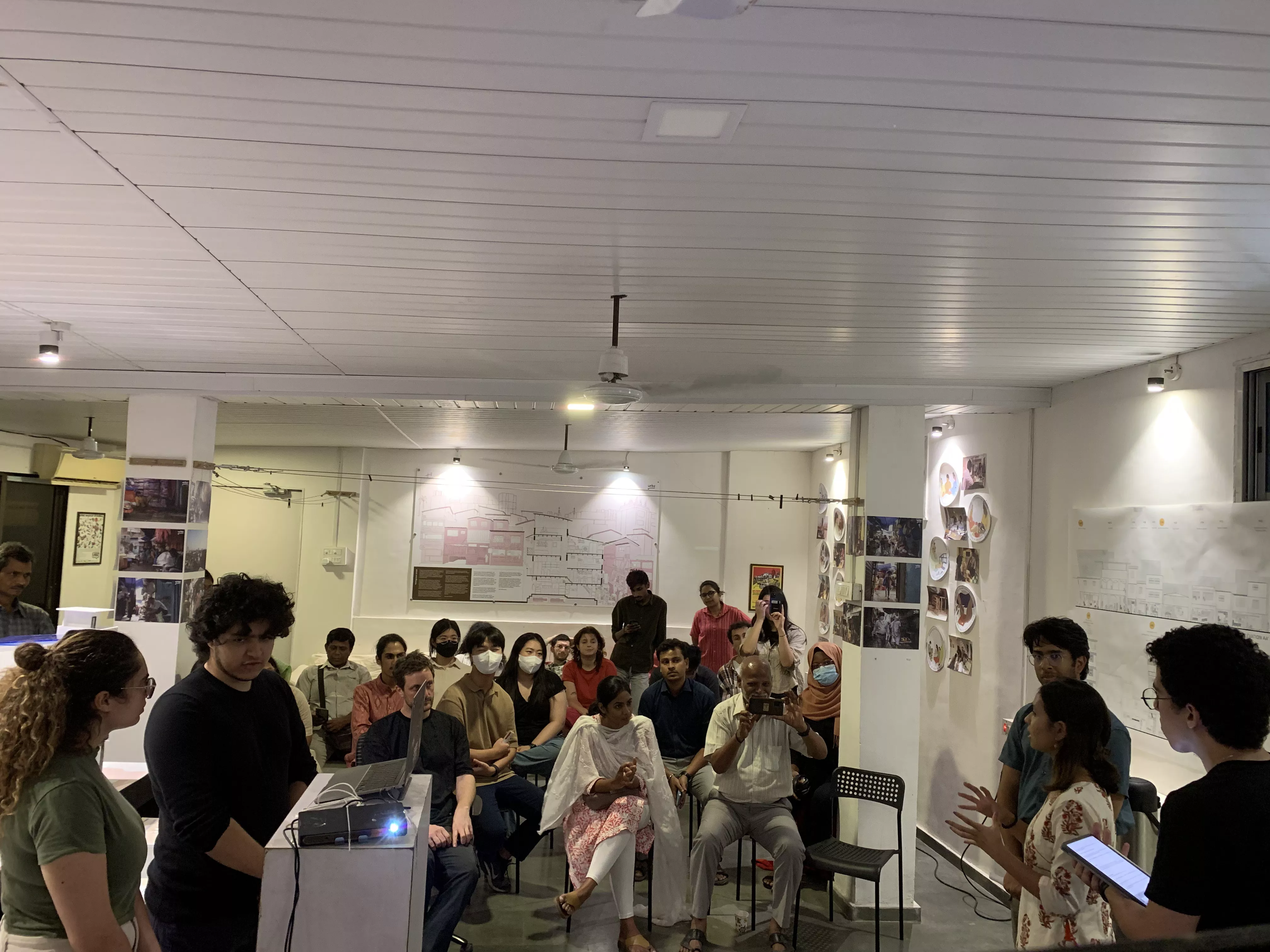 NYUAD students presenting their projects at the Homegrown street exhibition