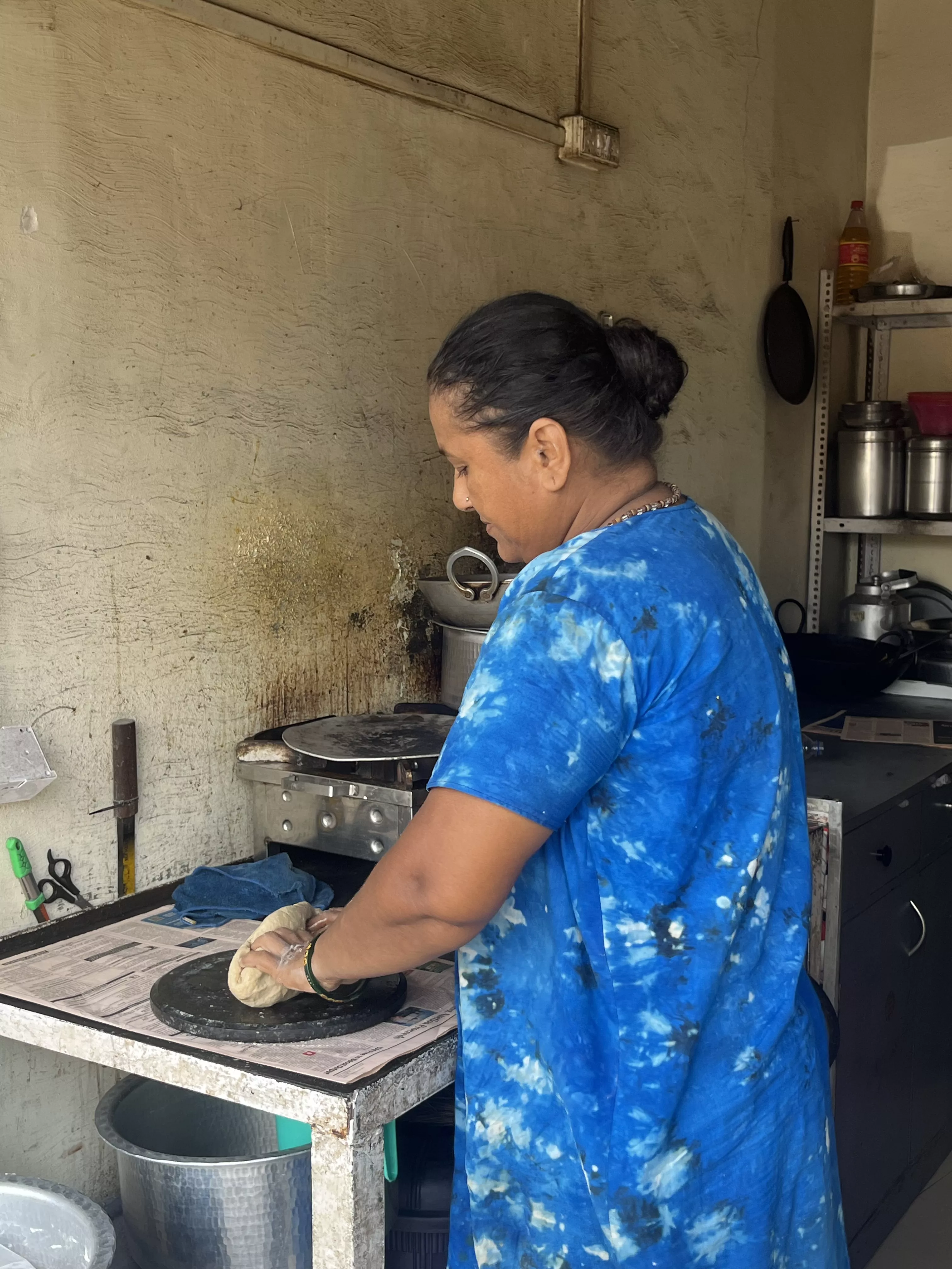 Jayashree kneading chapati dough.