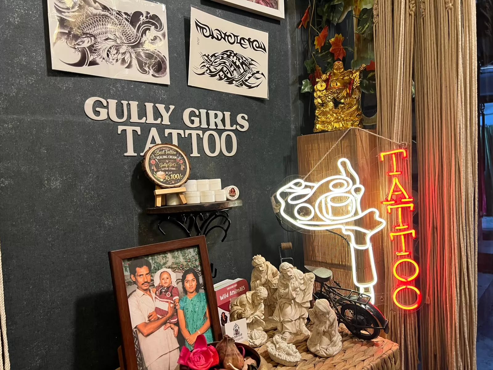 She is proud of her heritage and displays a picture of her family near the entrance. Next to it lies a card of her saree business, Karuvaachi.