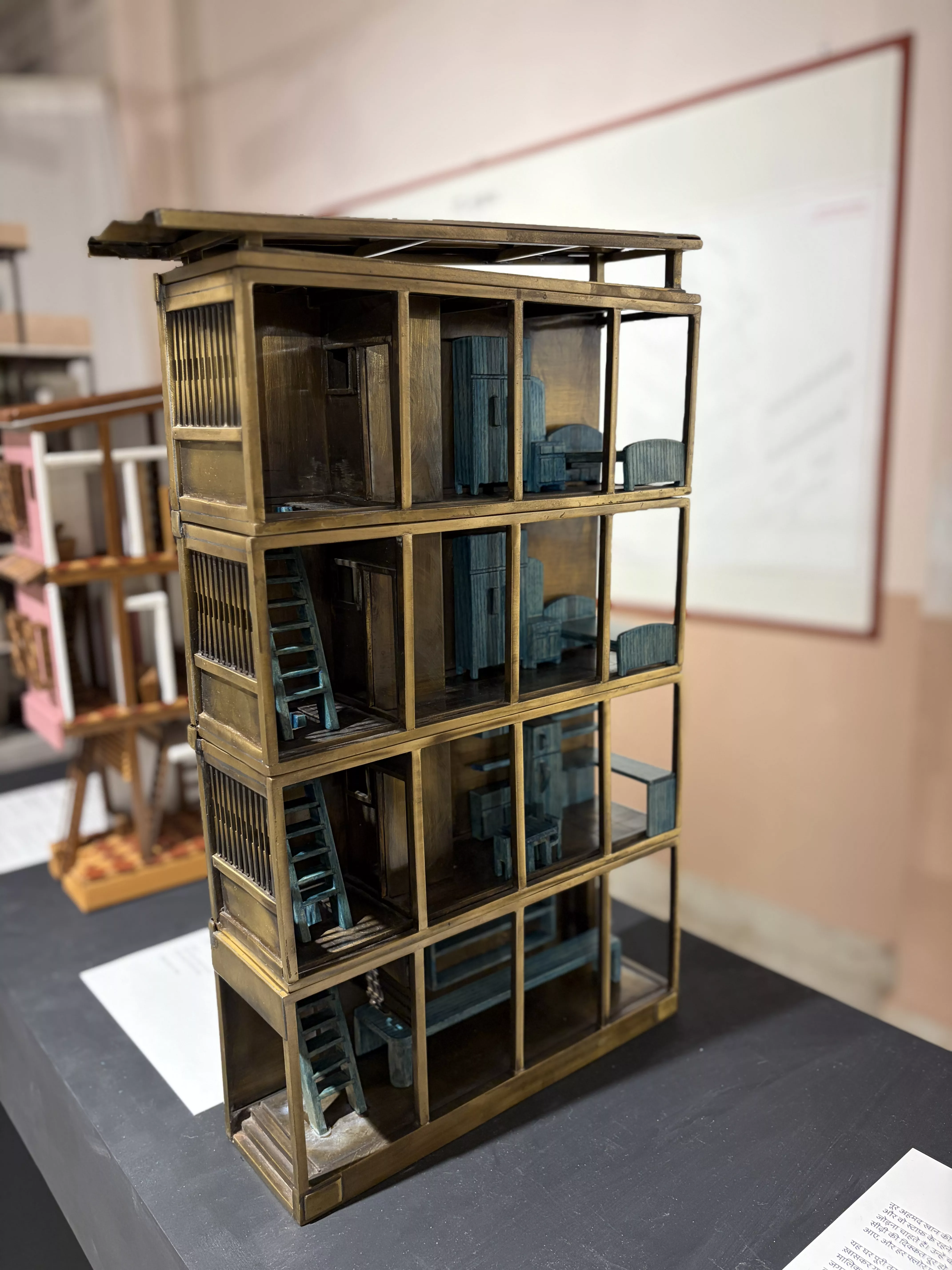 Model showing the craftsmanship of Kishor Rokde (Brass) and Mohammad Zubair Ansari (Wood furniture)